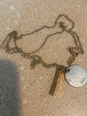 Julio long necklace with gold tone bar and silver tone round charm